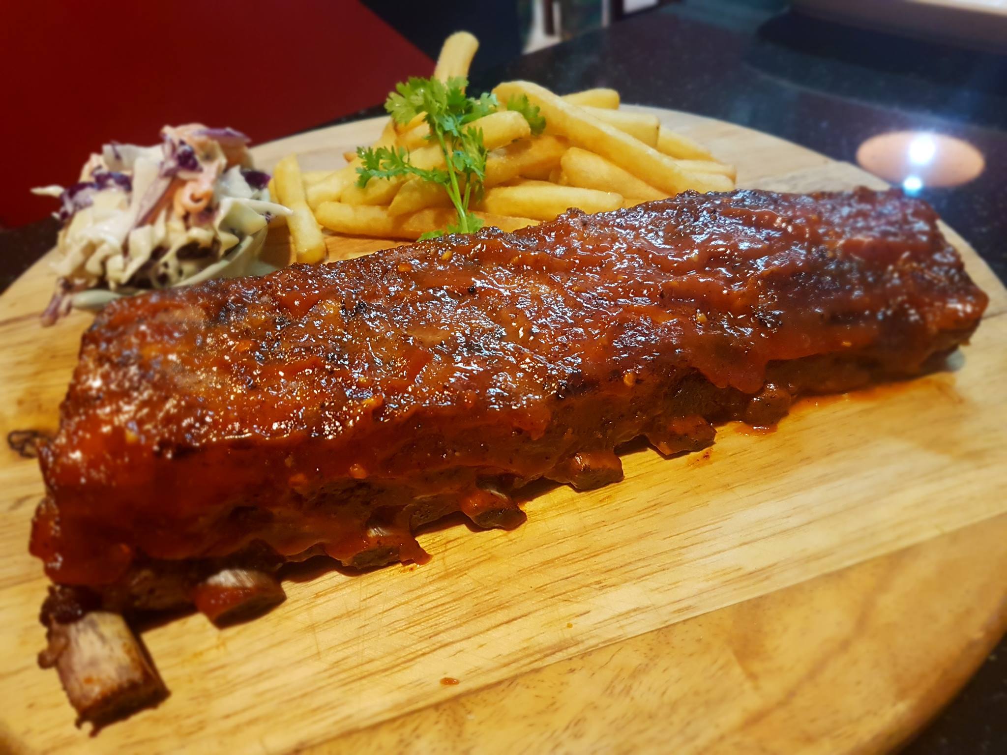 Barbecue ribs with fries and slaw