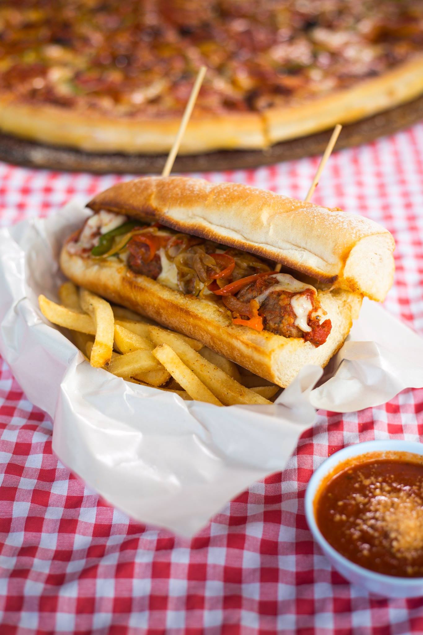 A toasted Roadhouse sandwich with fries